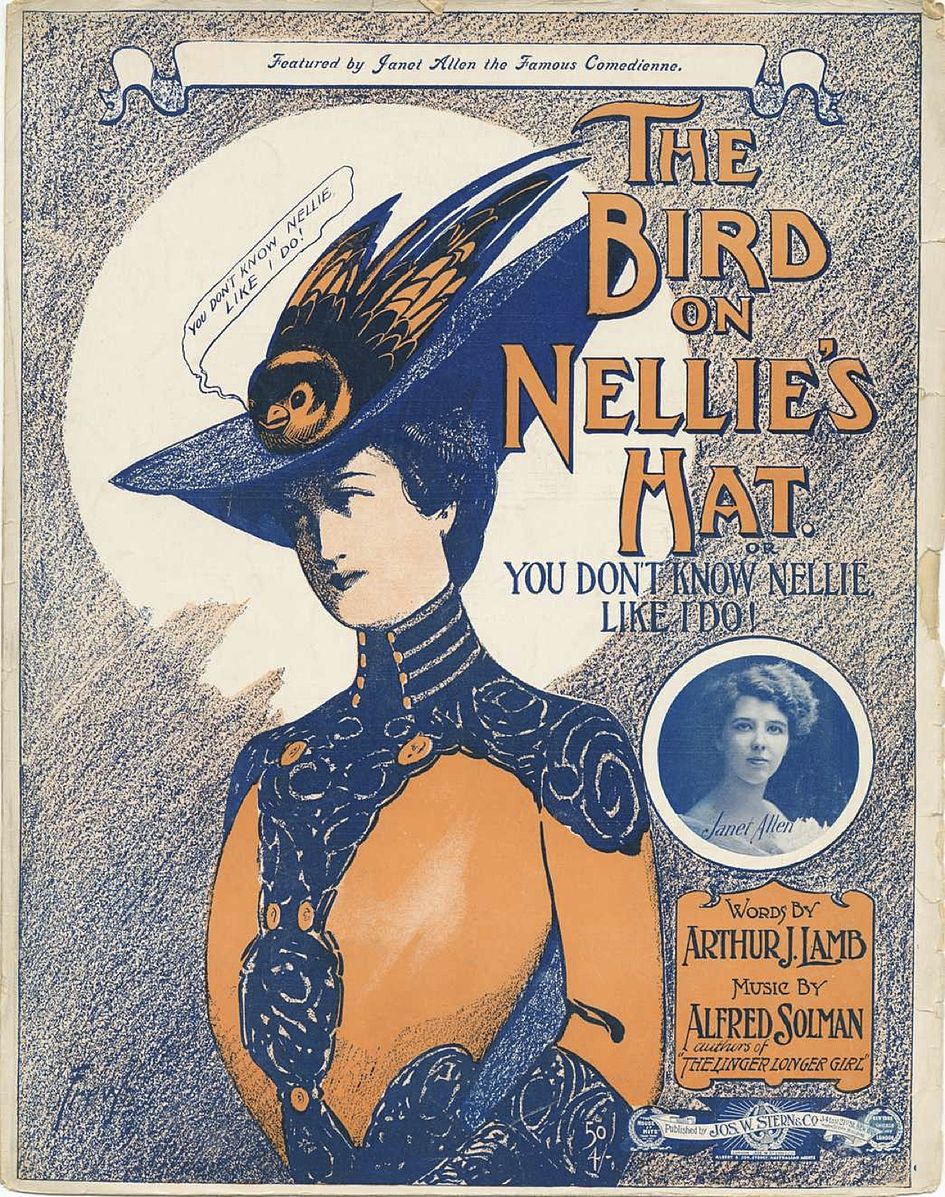 Bird_on_Nellie's_Hat.jpg